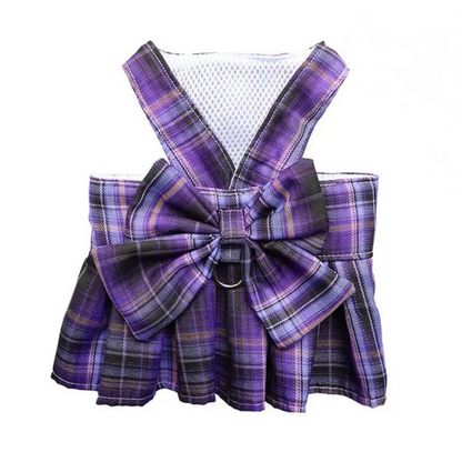 Purple plaid pet dress with a bow on a white background